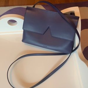 Vince Signature V leather baby crossbody bag. In great condition!